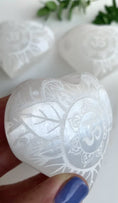 Load and play video in Gallery viewer, Selenite Om Mandala Etched Puffy Heart
